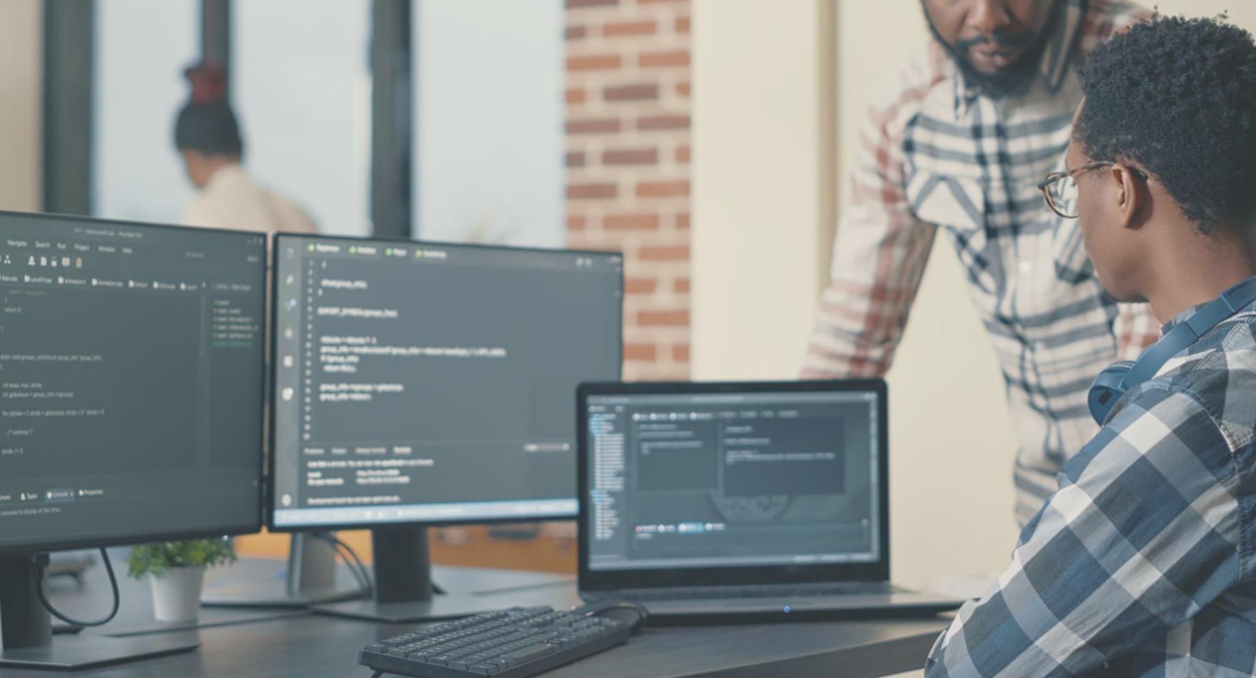 Designer working on accessibility testing with various color contrast tools